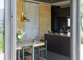 Cuisine-ilot-ouverte-noir-mat-et-inox-perene Cuisine-ilot-ouverte-noir-mat-et-inox-perene