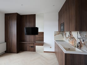 Cuisine + meuble TV d'un des 3 studios