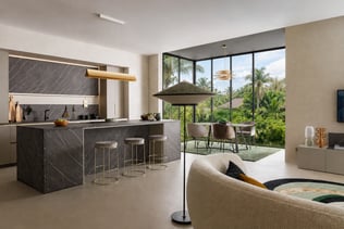 Cuisine sur mesure Perene avec îlot central en pierre, finitions haut de gamme, mobilier contemporain et large baie vitrée offrant une vue panoramique. Cuisine sur mesure Perene avec îlot central en pierre, finitions haut de gamme, mobilier contemporain et large baie vitrée offrant une vue panoramique.