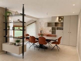 Séjour ambiance beige et terracota avec meuble de rangement