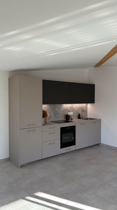 Vue d'une nouvelle perspective de la cuisine ouverte